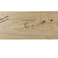 Wooden block with engraved text on a white background
