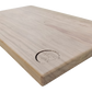 Wooden cutting board with engraved design on a white background